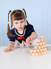 Image showing Preschool-age girl playing with Lotto