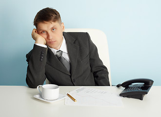 Image showing Manager bored in office without job