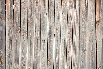 Image showing Weathered wooden wall with stains and cracks