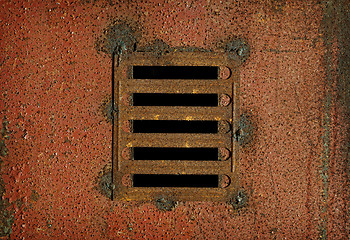 Image showing Lattice on steel rusty wall - industrial background