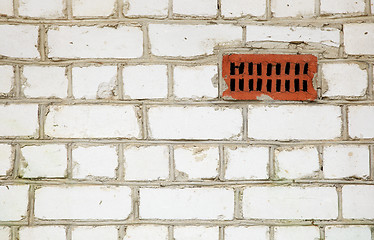 Image showing Brick wall with primitive ventilation