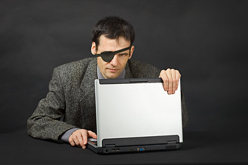 Image showing Computer pirate look with one eye