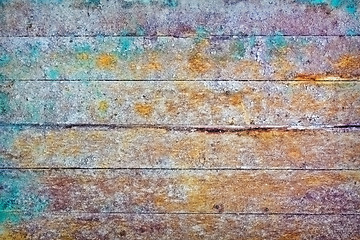 Image showing Wall - rotten boards with colored stains