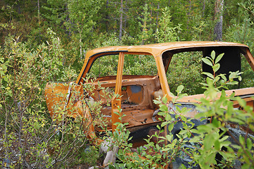 Image showing Rusty case of old car in wood