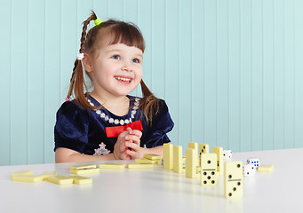 Image showing Happy child playing with toys