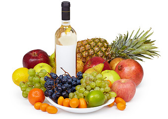 Image showing Still life - tropical fruits and bottle of wine