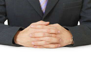 Image showing Hands on white table