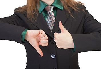 Image showing Woman shows gestures - thumbs upwards and downwards