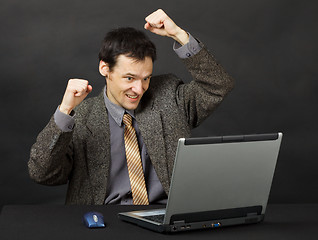 Image showing Man - football fan, watches football match in Internet