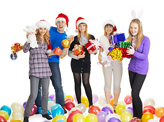 Image showing Happy friends with New Year's gifts on white background