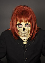 Image showing Masked man - skeleton in red wig