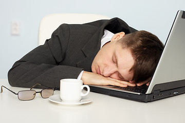 Image showing Businessman not enough sleep