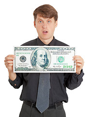 Image showing Funny stupid man holding a big money