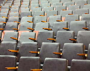 Image showing Rows of old theater seats covered with leather