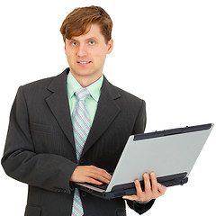 Image showing Man with laptop in hand on white background