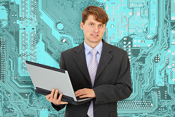 Image showing Smiley Engineer - electronics with computer
