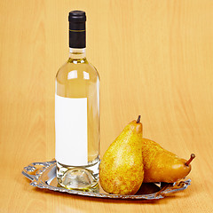 Image showing Still life from bottle of pear wine