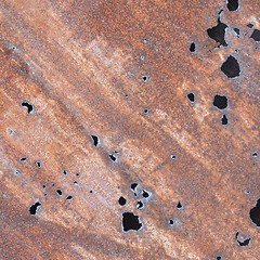 Image showing Iron sheet with rust and through holes