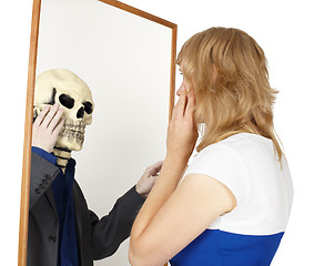 Image showing Girl looks into false mirror