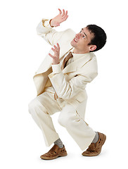 Image showing Frightened young man on white background