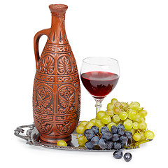 Image showing Still life - clay jug and glass of red wine