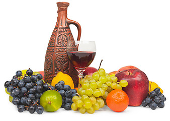 Image showing Large still life - clay bottle, glass and fruits