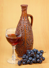 Image showing Ceramic jug and a glass