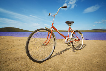 Image showing Old-fashioned bicycle on summer beach