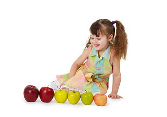 Image showing Little girl on white background with apples