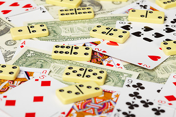 Image showing Playing cards, dominoes and money