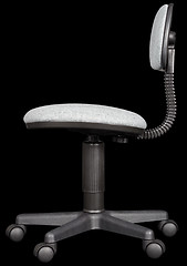 Image showing Office chair isolated on black background