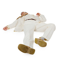 Image showing Defeated Businessman lying on white