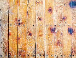 Image showing Wall covered with old scratched boards