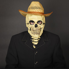 Image showing Skeleton in straw hat