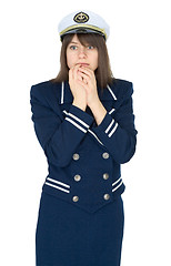 Image showing Scared woman in uniform of sea captain isolated on a white