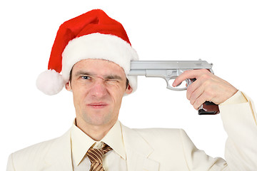 Image showing Man in Christmas hat tries to shoot himself