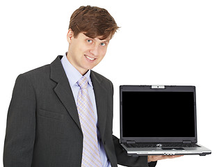 Image showing Friendly smiling person holds laptop on hand