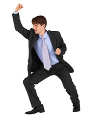 Image showing Businessman punching up on white background