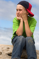 Image showing Child in cap looking sideways