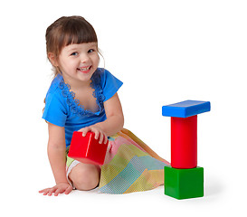 Image showing Girl playing with toys