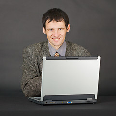 Image showing Young man with computer