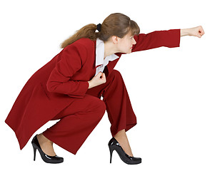 Image showing Businesswoman in combat position on white