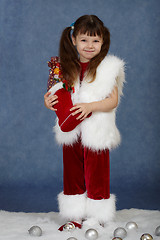 Image showing Little girl received Christmas gift