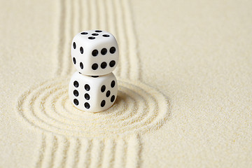 Image showing Composition on Zen garden - sand, and two dice