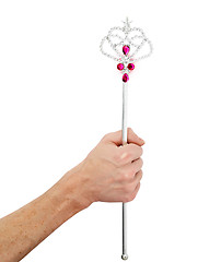 Image showing Male hand holds magic wand - father gives gifts to children