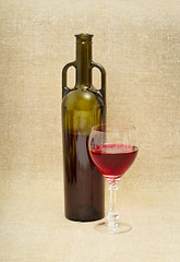 Image showing Bottle and glass with red wine