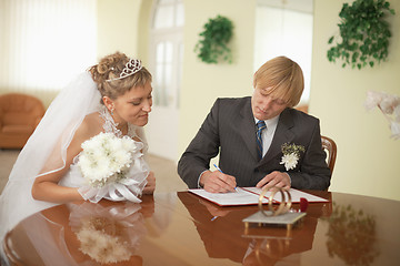 Image showing Groom and bride - registration of marriage