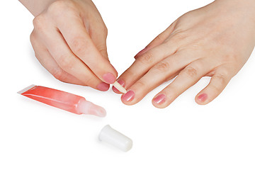 Image showing Female hands. Cuticle removal.