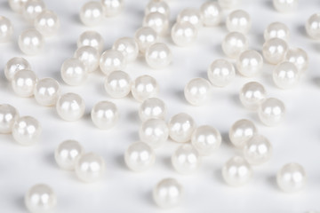 Image showing Fake pearls scattered on table