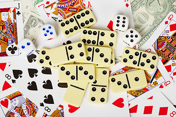 Image showing Background - playing cards, dice, money, and dominoes